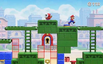 Mario läuft durch eine Spiellandschaft im Spiel "Mario vs. Donkey Kong"; Bild: Nintendo